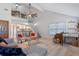 Bright and airy living room boasting high ceilings, open staircase, and lots of natural light at 1254 Seminola Blvd, Casselberry, FL 32707