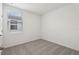 Neutral bedroom has carpet, white walls, and natural light from the window at 1373 Current Pl, Haines City, FL 33844