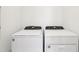 New, modern, front-loading washer and dryer units in laundry area at 1373 Current Pl, Haines City, FL 33844