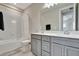 Bathroom with double vanity, bathtub, and shower at 15913 Winding Bluff Dr, Montverde, FL 34756