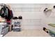 Large walk-in closet with wire shelving and storage containers at 15913 Winding Bluff Dr, Montverde, FL 34756