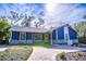 Newly renovated home with a charming white and blue exterior at 1720 Overlook Rd, Longwood, FL 32750