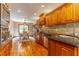 Modern kitchen with stainless steel appliances and wood cabinets at 1720 Overlook Rd, Longwood, FL 32750