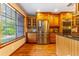 Modern kitchen with stainless steel appliances and wood cabinets at 1720 Overlook Rd, Longwood, FL 32750