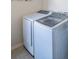 Bright laundry room with washer and dryer at 17454 Chateau Pine Way, Clermont, FL 34711