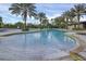 Resort-style community pool with palm trees at 17584 Saw Palmetto Ave, Clermont, FL 34714