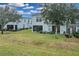 View of the backyard and neighboring homes at 20620 Maxim Pkwy, Orlando, FL 32833