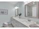 Elegant bathroom with double vanity and large mirror at 20620 Maxim Pkwy, Orlando, FL 32833