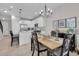 Dining area with a table and chairs, adjacent to the kitchen at 20620 Maxim Pkwy, Orlando, FL 32833