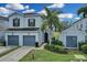 Two-story house with two-car garage and landscaped lawn at 20620 Maxim Pkwy, Orlando, FL 32833