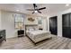 Large bedroom with king-size bed, neutral tones, and modern decor at 2540 Albany Dr, Kissimmee, FL 34758