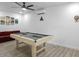 Game room with pool table and comfortable seating at 2540 Albany Dr, Kissimmee, FL 34758