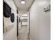 Hallway with view into kitchen, featuring modern design at 2540 Albany Dr, Kissimmee, FL 34758