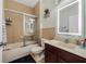 Clean bathroom with tub shower combo, vanity, and updated fixtures at 2556 Antlia Dr, Orlando, FL 32828