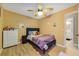 Cozy bedroom with a double bed and ample closet space at 2556 Antlia Dr, Orlando, FL 32828