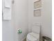 Small bathroom with toilet and neutral color scheme at 2639 Calistoga Ave, Kissimmee, FL 34741