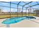 Inviting kidney-shaped pool with a spa at 2639 Calistoga Ave, Kissimmee, FL 34741