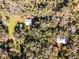 Aerial view showing two homes on a large wooded lot at 2675 Van Arsdale St, Oviedo, FL 32765