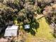 Aerial view of property, showcasing home and outbuildings at 2675 Van Arsdale St, Oviedo, FL 32765