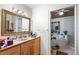 Bathroom with double vanity and a large tub at 2675 Van Arsdale St, Oviedo, FL 32765