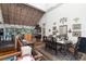 Open dining area adjacent to kitchen with wood floors and unique decor at 2675 Van Arsdale St, Oviedo, FL 32765