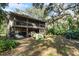 Elevated home on stilts with wooded backyard at 2675 Van Arsdale St, Oviedo, FL 32765