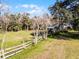 Large pasture area with wooden fence and trees at 2675 Van Arsdale St, Oviedo, FL 32765