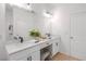 Bright bathroom featuring double sinks and modern design at 2950 Timber Hawk Cir, Ocoee, FL 34761