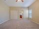 Spacious bedroom with carpet floors and double doors to closet at 2984 Cedar Glen Pl, Oviedo, FL 32765