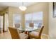 Breakfast nook with a glass table and chairs at 2984 Cedar Glen Pl, Oviedo, FL 32765