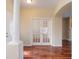 Elegant entryway with hardwood floors and French doors at 2984 Cedar Glen Pl, Oviedo, FL 32765