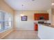 Bright kitchen with stainless steel appliances and wood cabinets at 2984 Cedar Glen Pl, Oviedo, FL 32765