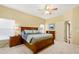 Main bedroom with king-size bed, ample closet space, and neutral decor at 2984 Cedar Glen Pl, Oviedo, FL 32765