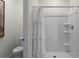 Bathroom with toilet and shower stall at 2986 Salisbury Ave, Haines City, FL 33844