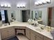 Large bathroom with double vanity and corner shower at 3315 Newbliss Cir, Ormond Beach, FL 32174