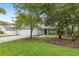 House exterior showcasing a well-maintained lawn at 3315 Newbliss Cir, Ormond Beach, FL 32174