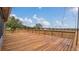 Large wooden deck overlooking a sprawling landscape at 3433 Glossy Leaf Ln, Clermont, FL 34711