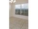 Bright dining area with tile floors and large window at 4029 Marina Isle Dr, Kissimmee, FL 34746