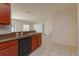 Modern kitchen features granite countertops and dark wood cabinets at 4029 Marina Isle Dr, Kissimmee, FL 34746