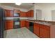 Spacious kitchen with wood cabinets and granite countertops at 4029 Marina Isle Dr, Kissimmee, FL 34746