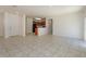 Open living room with tile floors and kitchen views at 4029 Marina Isle Dr, Kissimmee, FL 34746