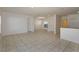 Spacious living area with tile floors and access to kitchen at 4029 Marina Isle Dr, Kissimmee, FL 34746