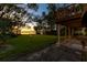 Relaxing backyard patio with lake view and sunset at 4108 Downeast Ln, Windermere, FL 34786