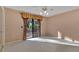 Bedroom with sliding glass doors leading to a deck at 4108 Downeast Ln, Windermere, FL 34786