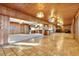 Spacious dining room with tile floors and wood paneling at 4108 Downeast Ln, Windermere, FL 34786