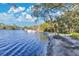 Lakefront view with private dock and boat storage at 4108 Downeast Ln, Windermere, FL 34786