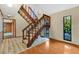 Wooden staircase in the entryway of the house at 4108 Downeast Ln, Windermere, FL 34786