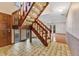 View of a wooden staircase leading to the upper level of the home at 4108 Downeast Ln, Windermere, FL 34786