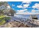 Stunning waterfront view with boat dock and tranquil scene at 4108 Downeast Ln, Windermere, FL 34786