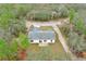 Single story house on a wooded lot with driveway at 431 Rainbow Ct, Kissimmee, FL 34759